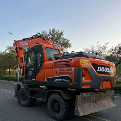 Doosan DX210W ব্যবহৃত চাকা খননকারী হাইড্রোলিক মিনি সেকেন্ড হ্যান্ড খননকারী 20100 কেজি